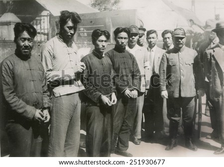 Four Chinese who guarded the British in concession of Tientsin as Japanese prisoners. Accused of murder of a high functionary, they are at the High Court of Chinese Justice. Nov. 4, 1939.