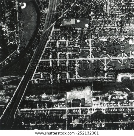 1956 aerial photograph of Love Canal showing a school and houses built over and near a landfill. Niagara Falls, New York.