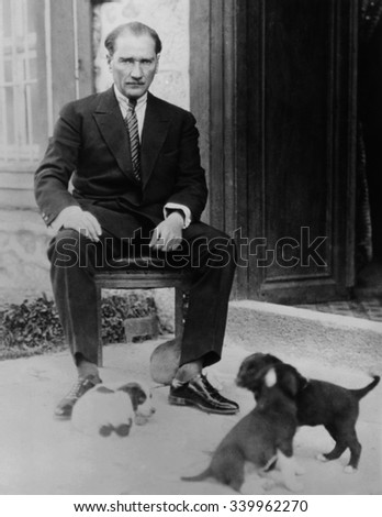 Mustafa Kemal Ataturk, President of Turkey, with his pet dogs, ca. 1930. As part of Kemal's modernization and Westernization of Turkey, he encouraged the acceptance of dogs, and the end to their relig
