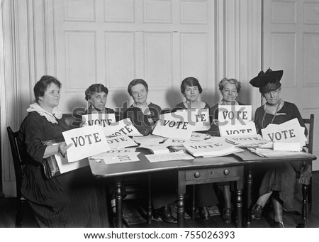 National League of Women Voters hold up signs reading, \'VOTE\', Sept. 17, 1924. Millions of women voted in 1920 and 1924, but in a lower proportion than men.