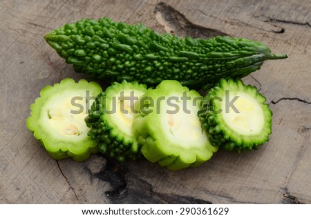 Bitter melon isolated on wooden board