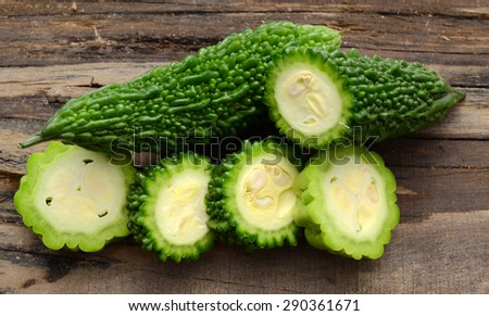 Bitter melon isolated on wooden board