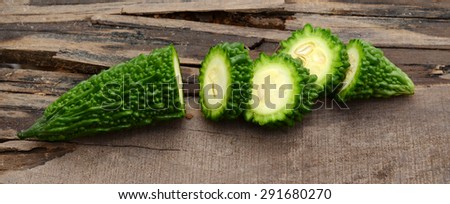 Bitter melon on wooden board