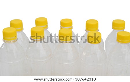 Four plastic bottles with generic labels