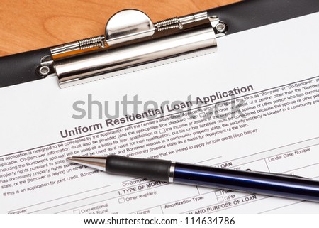 Mortgage loan application form on the table