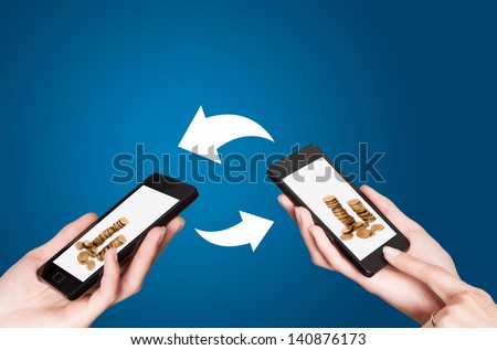 Two mobile phones with NFC payment technology. Near field communication