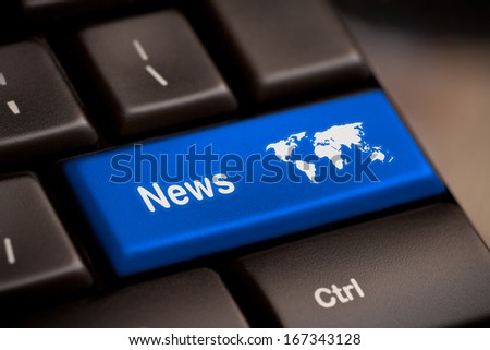 A news key button on laptop white keyboard