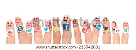 BELCHATOW POLAND AUGUST 31 2014 Happy group of finger smileys with popular social media logos printed on paper and stuck to the fingers BELCHATOW POLAND AUGUST 31 2014 Happy group of finger smileys with popular social media logos printed on paper and stuck to the fingers