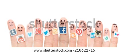BELCHATOW POLAND AUGUST 31 2014 Happy group of finger smileys with popular social media logos printed on paper and stuck to the fingers BELCHATOW POLAND AUGUST 31 2014 Happy group of finger smileys with popular social media logos printed on paper and stuck to the fingers