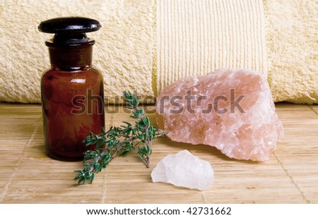 Holistic therapy set, focus around the oil bottle.