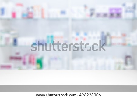 counter store table pharmacy background shelf blurred blur focus drug medical shop drugstore medication blank medicine pharmaceutics concept - stock image