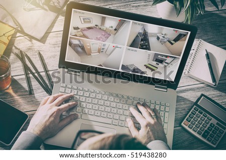 home camera cctv monitoring monitor smart house video system hand exterior closeup concept - stock image