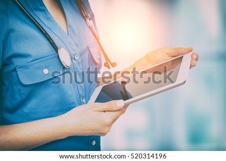 doctor digital tablet clinic medicine patient health background concept - stock image