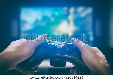 gaming game play tv fun gamer gamepad guy controller video console playing player holding hobby playful enjoyment view concept - stock image