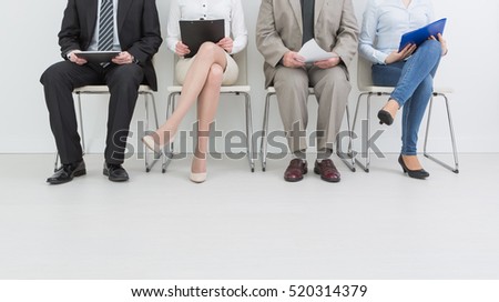 hire employment employ interview candidate hiring legs business waiting cv women sitting queue group employer elegant executive caucasian female male indoors men colleague room concept - stock image