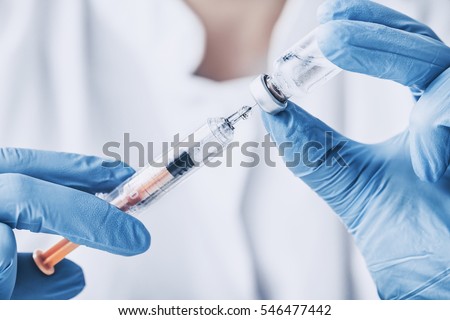 injecting injection vaccine vaccination medicine flu man doctor insulin health drug influenza concept - stock image