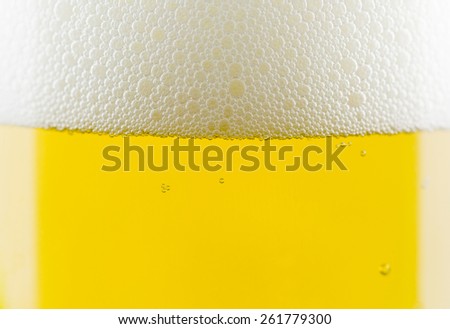 Beer bubbles close-up in glass.