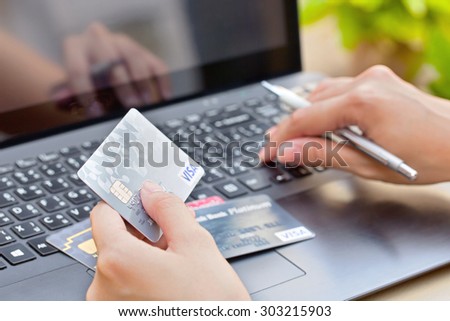Nakhonratchasima, THAILAND - August 1, 2015 : Credit card VISA brand with pen on keyboard.