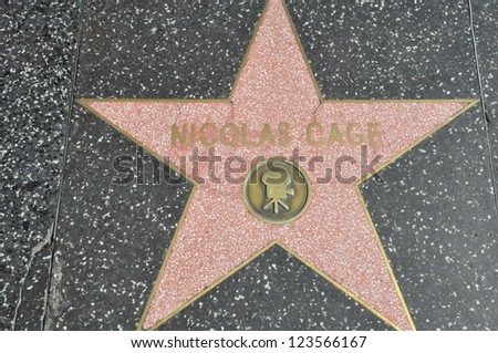 HOLLYWOOD - DECEMBER 7: Nicolas Cage\'s star on Hollywood Walk of Fame on December 7, 2012 in Hollywood, California. This star is located on Hollywood Blvd. and is one of 2400 celebrity stars.