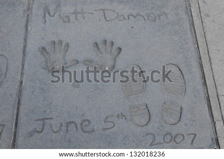 HOLLYWOOD, CA - DECEMBER 7 : Footprints and hand prints of Matt Damon at the Kodak theater pictured on December 7, 2012 in Hollywood, California, USA.