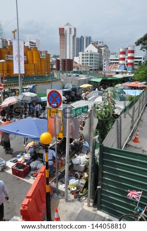 SINGAPORE - AUGUST 16: Sungei Road in Singapore as seen on August 16, 2012. Since the 1930s, this road has been synonymous with the Thieves\' Market, the largest and oldest flea market in Singapore.