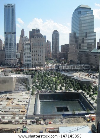 New York City - July 5: National September 11 Memorial &Amp; Museum At The World Trade Center Site As Seen On July 5, 2013. This Is The Principal Memorial Commemorating The September 11 Attacks Of 2001.