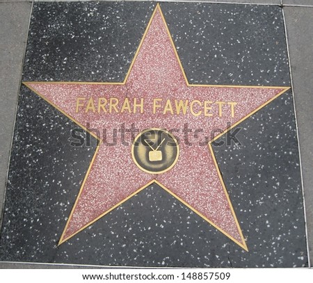 HOLLYWOOD - JULY 11: Farrah Fawcett's star on Hollywood Walk of Fame on July 11, 2013 in Hollywood, California. This star is located on Hollywood Blvd. and is one of 2400 celebrity stars.