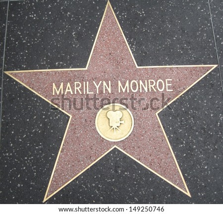 HOLLYWOOD - JULY 11: Marilyn Monroe\'s star on Hollywood Walk of Fame, as seen on July 11, 2013 in Hollywood in California. This star is located on Hollywood Blvd. and is one of 2400 celebrity stars.