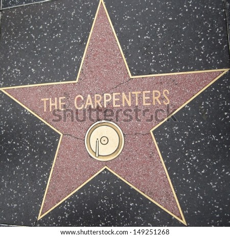 HOLLYWOOD - JULY 11: The Carpenters\' star on Hollywood Walk of Fame, as seen on July 11, 2013 in Hollywood in California. This star is located on Hollywood Blvd. and is one of 2400 celebrity stars.