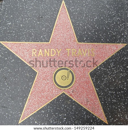 HOLLYWOOD - JULY 11: Randy Travis\' star on Hollywood Walk of Fame, as seen on July 11, 2013 in Hollywood in California. This star is located on Hollywood Blvd. and is one of 2400 celebrity stars.