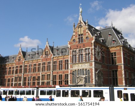 AMSTERDAM - AUGUST 29: Central Station, as seen on August 29, 2008 in Amsterdam, Holland. Central Station is the central railway station of Amsterdam and is used by 250,000 passengers a day.