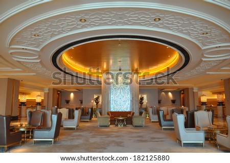 ABU DHABI, UAE - FEB 15: Interior of Emirates Palace Hotel in Abu Dhabi, UAE, as seen on Feb 15, 2014. It is a seven star luxury hotel and has its own marina and helipad.