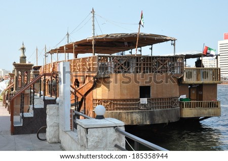 DUBAI, UAE - FEB 13: Boats, abras, dhows at Dubai Creek in the UAE, as seen on Feb 13, 2014. The creek still remains a significant trading hub for goods traded between Iran and The Arabian Peninsula.