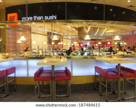 DUBAI, UAE - FEB 16: Yo Sushi at Dubai Mall in the UAE, on Feb 16, 2014,. Dubai Mall is the worlds largest shopping mall based on total area and 6th largest by gross leasable area.