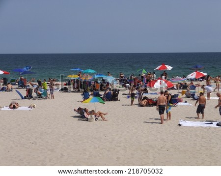 SEASIDE HEIGHTS, NEW JERSEY - AUG 17: Beach at Seaside Height at Jersey Shore in New Jersey, as seen on August 17, 2014. The Casino pier here features numerous rides and attractions.