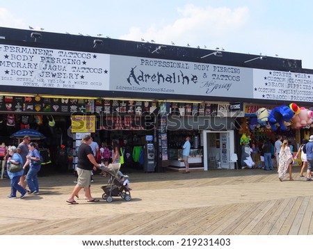 SEASIDE HEIGHTS, NEW JERSEY - AUG 17: Stores at Seaside Heights at Jersey Shore in New Jersey, as seen on August 17, 2014. The Casino pier here features numerous rides and attractions.
