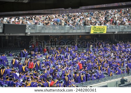 NEW YORK, NY - MAY 22: New York University (NYU) 181st Commencement Ceremony at the Yankee Stadium in New York City, as seen on May 22, 2013. Over 14000 degree students graduated at the ceremony..