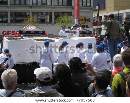 TORONTO - MAY 10: Dairy Queen makes the world\'s largest ice-cream cake on May 10, 2011 at Yonge Dundas Square in Toronto, Canada.
