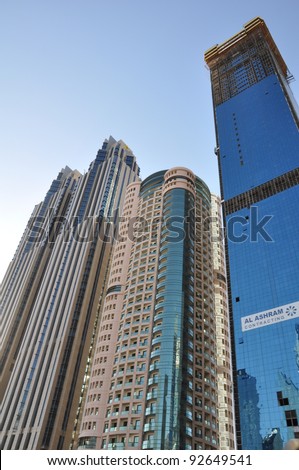 DUBAI, UAE - DECEMBER 26: View of Sheikh Zayed Road skyscrapers in Dubai, UAE on December 26, 2011. More than 25 skyscrapers taller than 100 meters can be found here.