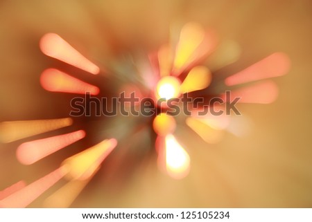 Abstract background with blurred light rays. Rays of light scatter in different directions