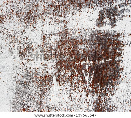 Rusty white metallic background. Old metal plate with white paint.