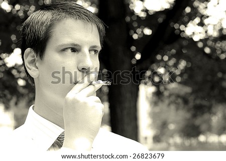 black-and-white portrait of smoker man