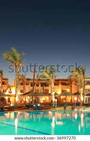 Tropical hotel at night. Morocco.