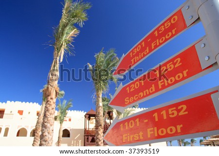 Three red signs in the hotel. Morocco.