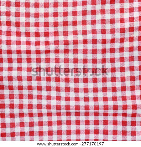Red and white fabric texture, red linen checkered tablecloth background.
