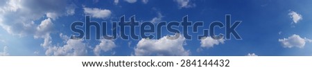 Blue sky and white clouds over horizon. Sky panoramas, high res.