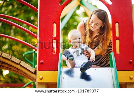 Mother and son on playground