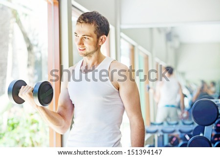 man doing exercises at home or in gym