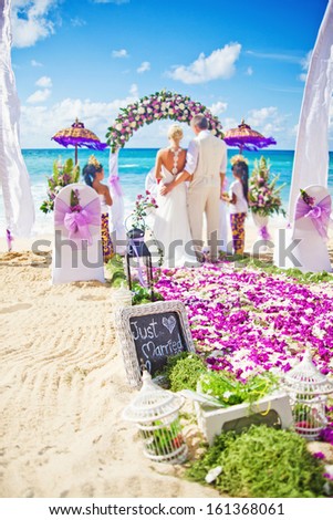 wedding in bali (focus on the board with text)