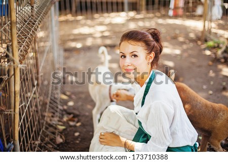 Woman Working In Animal Shelter